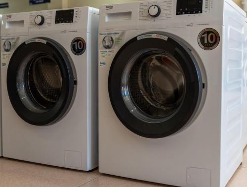 Lavadoras Beko condiseño elegante, con una carga de 10kg frontal.